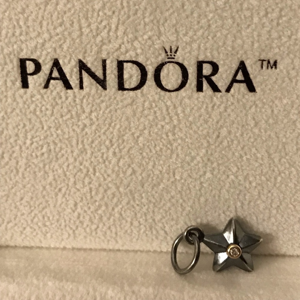 SS/14k gold oxidized star with a diamond